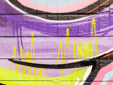 VARNA - 18 November: Detail of graffiti on a concrete wall Perspective. Grungy concrete surface with cracks, scratches and streaks of paint. November 18, 2015 in Varna, Bulgariaのeditorial素材