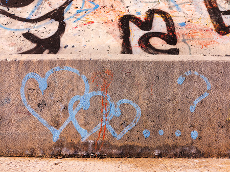 VARNA - 18 November: Detail of graffiti on a concrete wall. Grungy concrete surface with cracks, scratches and streaks of paint. November 18, 2015 in Varna, Bulgariaのeditorial素材