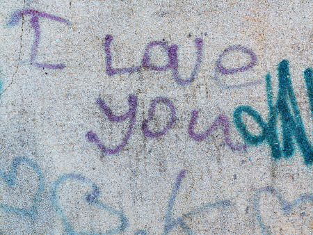 Zhitomir, Ukraine - February 7: Detail of graffiti on a concrete wall. Grungy concrete surface with cracks, scratches and streaks of paint. February 7, 2016 in Zhitomir, Ukraineのeditorial素材