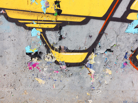 Concrete, weathered, worn wall damaged paint. Grungy Concrete Surface. Great background or texture.のeditorial素材