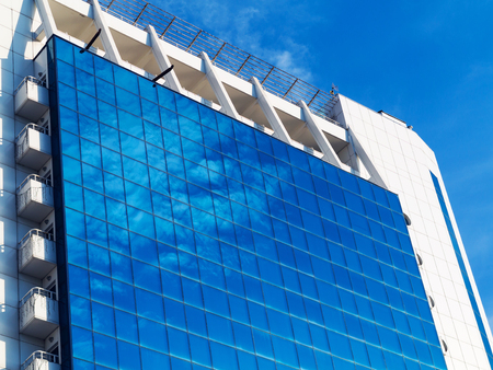 Bottom view of modern high rise building in the port of Odessa in the sunset at the end of the dayのeditorial素材