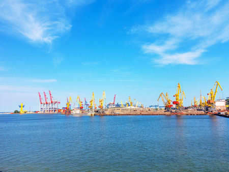 Odessa, Ukraine - July 6, 2016: Container cranes in cargo port terminal, cargo cranes without job in an empty harbor port. A crisis. Defaulted paralyzed entire economy of stateのeditorial素材