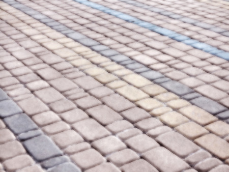 Abstract blurred background decorative paving slabs viewed at a slight angleの写真素材