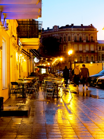 ODESSA, UKRAINE - October 4, 2016: Night city street lamps in the light of a rainy day. Creative blur. Dynamic city night scene of October 4, 2016 in Odessaのeditorial素材