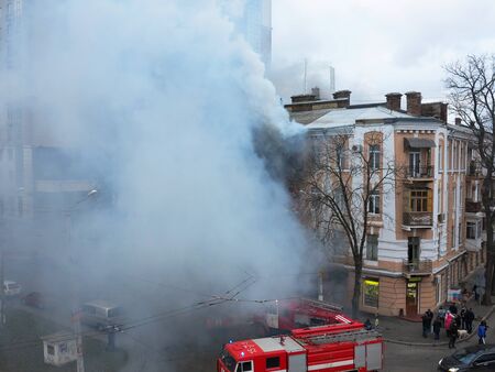 Odessa Ukraine - December 29, 2016: A fire in apartment building. Strong bright light and clubs...