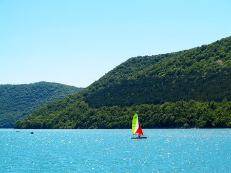 Abrau-Durso - May 5, 2018: People rest at the mountain lake Abrau. Abrau-Durso, Krasnodar Region, Russiaのeditorial素材