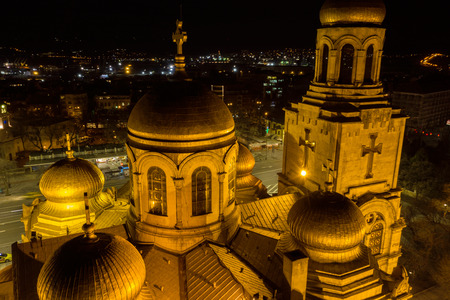 Varna, Bulgaria - January 22, 2019: Assumption Cathedral of Modern Byzantine style with golden domes illuminated by night.のeditorial素材