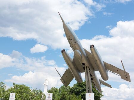 Odessa, Marinovka, Ukraine, July 15, 2018: Monument plane fighter in flight against the blue sky....