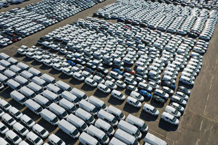 Odessa, Ukraine - August 11, 2021: Aerial view from drone to automobile customs terminal. Large number of cars at customs terminal are awaiting shipment. Accumulative customs platform for cars.のeditorial素材