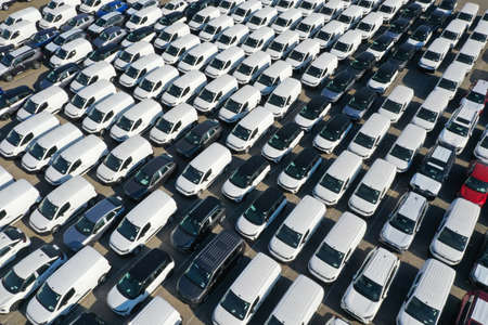 Odessa, Ukraine - August 11, 2021: Aerial view from drone to automobile customs terminal. Large number of cars at customs terminal are awaiting shipment. Accumulative customs platform for cars.のeditorial素材