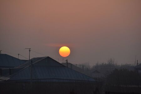 Amazing sunrise over a beautiful villageの写真素材