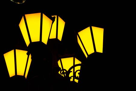 Street yellow lamp shining at nightの写真素材