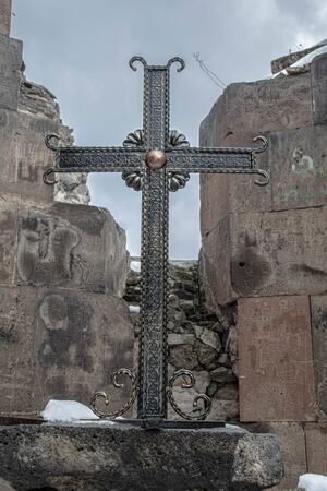 Cross among the ruins of an old templeの写真素材