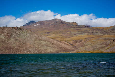 Small lake and Mount Aragats. Small mountain lake. Beautiful landscape with a lake