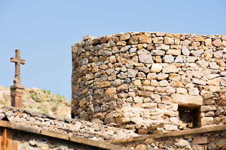 Old castle walls and crossのeditorial素材