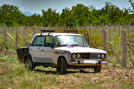 Ararat, Armenia, April 28, 2021. Old car on the field. Soviet carsのeditorial素材