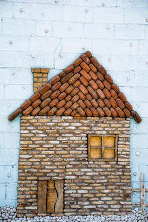 House of stones on the wallの写真素材