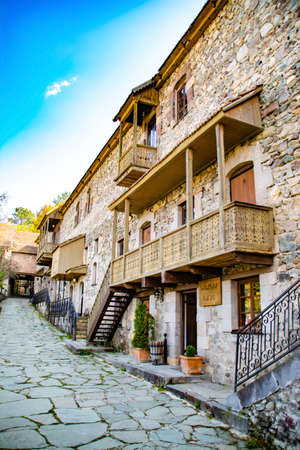Beautiful houses made of wood and stone. An old house with a unique design. Architecture of housesの写真素材