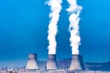 Steam of a nuclear power plant. A beautiful sight from the nuclear power plantの写真素材
