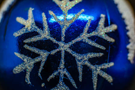 Christmas tree and toys. Blue Christmas toy and snowflake on itの写真素材