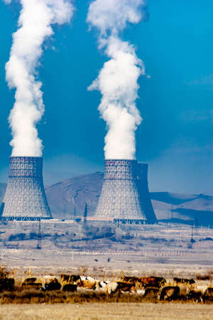 Steam of a nuclear power plant. A beautiful sight from the nuclear power plantの写真素材
