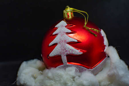 Christmas tree and toys. Red Christmas toy and Christmas tree on itの写真素材