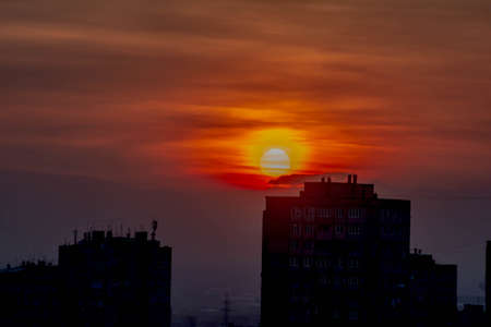 Very beautiful sunset in the background of the cityの写真素材