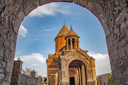 Church through the arches. religious cultural heritage. Old walls, arch and churchの写真素材