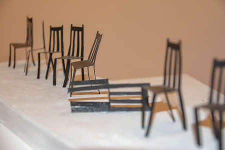 Small chairs on a white board. some chairsの写真素材