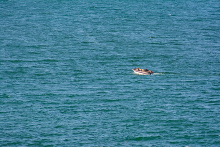 Boat in the sea. The boat rushes in the waters of the sea