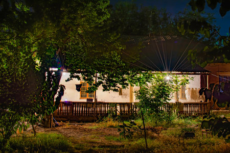 Old house in the forest. Village and houses, night landscapeの写真素材