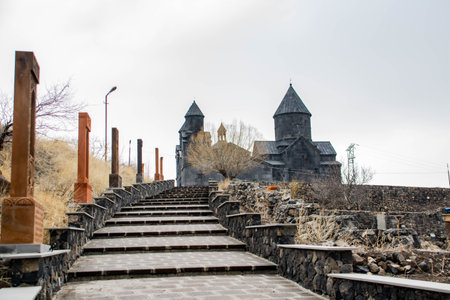 Stairs lead to the monastery. Khachkars and church. Armenian Church of Tegherの写真素材