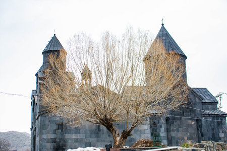 Old medieval castle in the city. Christian church. The old church is built of Basalt. Armenian...