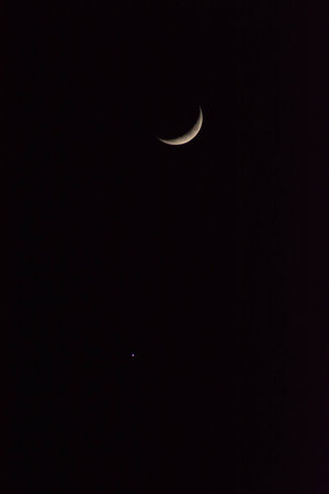 Moon in the night sky, closeup of photo with soft focus. Moon and planet Venus. Starry sky and moonの写真素材