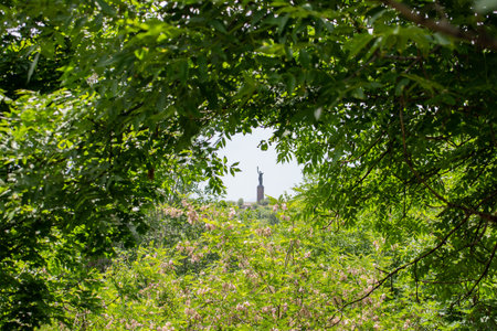 Monument in the forest. Monument to Mother Armenia and beautiful forest landscapeの写真素材