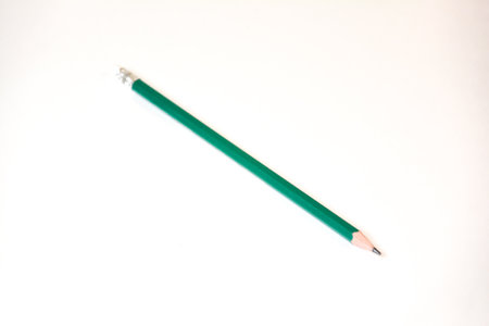 Green pencil isolated on white background. Back to school. Copy space.の写真素材