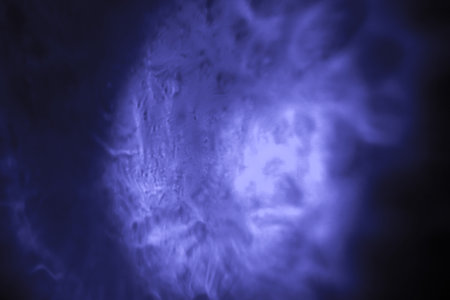 purple smoke on a dark blue background, abstract background, copy spaceの写真素材