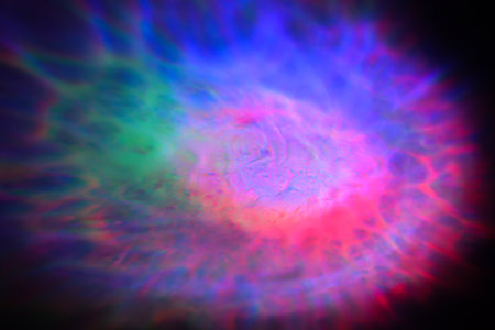 abstract background with colorful defocused lights and bokeh effectの写真素材