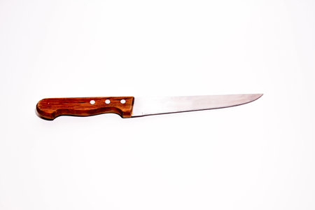 Knife isolated on white background. Kitchen knife with wooden handle.の写真素材