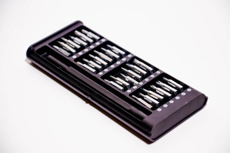 Set of screwdriver bits in a box isolated on white background.の写真素材