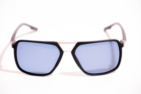 Sunglasses with a frame and lenses isolated on whiteの写真素材