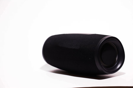 Black speaker isolated on a white background, studio shot, close-upの写真素材