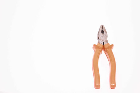 Pliers on a white background with space for your text or imageの写真素材