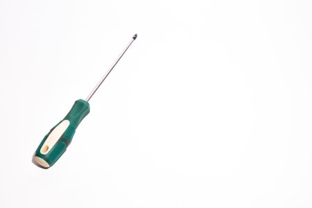 Screwdriver with green handle isolated on white background with clipping pathの写真素材