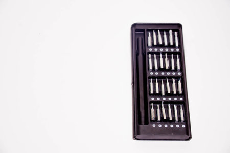 A set of screwdriver bits in a box on a white backgroundの写真素材