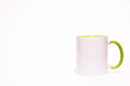 White mug isolated on white background with shadow. Copy space for text.の写真素材