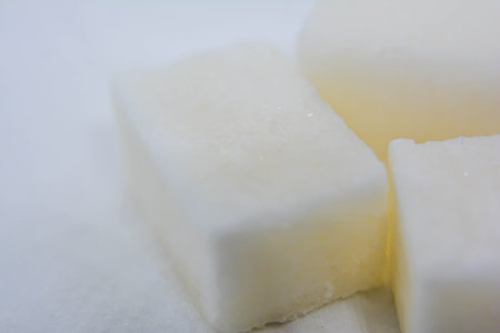 Sugar cubes on white background, close-up, macro.の写真素材