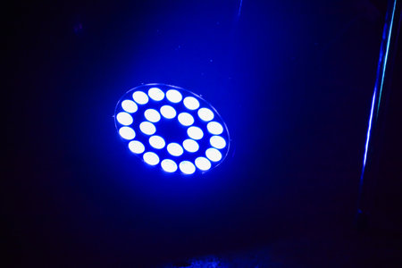 LED strip in the dark, close-up. Blue illumination.の写真素材