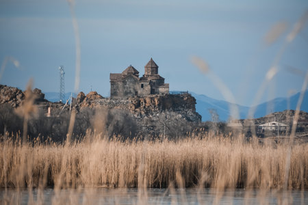 Church on the lake shore. Beautiful natural landscape with a temple.の写真素材