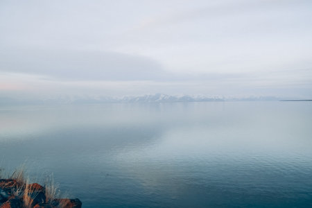 Lake Baikal in winter, Siberia, Russia. View of the lake and mountains.の写真素材